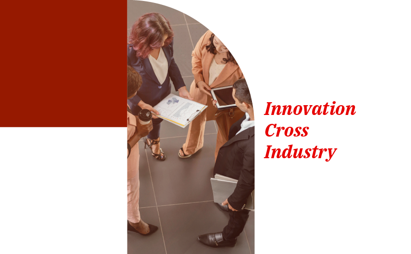 Quatro executivos, três mulheres e um homem, fazem uma roda em pé enquanto seguram um café, uma prancheta, pastas e um tablet. Ao lado está escrito 'Innovation Cross Industry'.